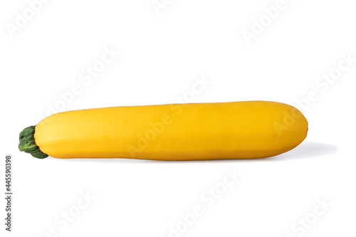 One realistic looking yellow zucchini or courgette - cucurbita pepo - isolated white background