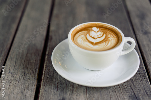 Latte art coffee in a white mug