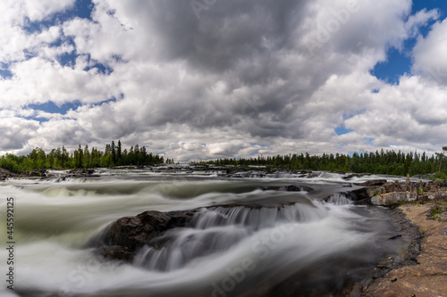 view of the Trappstegsforsarna waterfall in northern Sweden photo