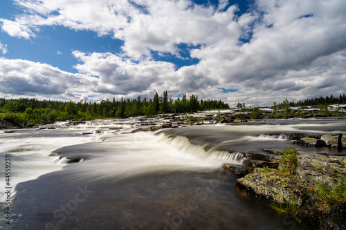 view of the Trappstegsforsarna waterfall in northern Sweden