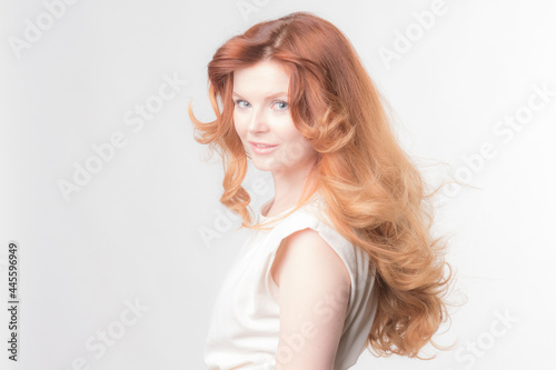Red-hair Model posing in studio
