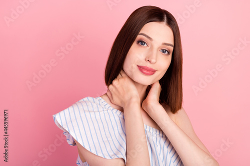 Photo of sweet brunette young lady hand neck wear white blouse isolated on pink color background