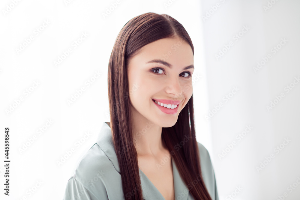 Photo of sweet adorable young lady grey sleepwear smiling indoors room home house Photo of sweet adorable young lady grey sleepwear smiling indoors room home house