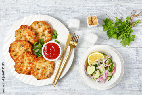 Cheesy Chicken Fritters on a plate, top view
