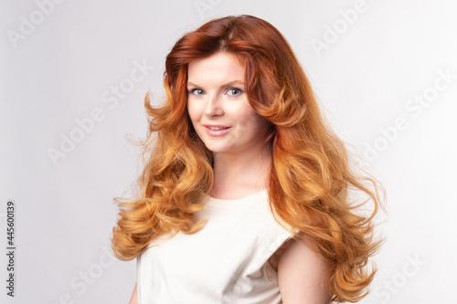 Red-hair Model posing in studio