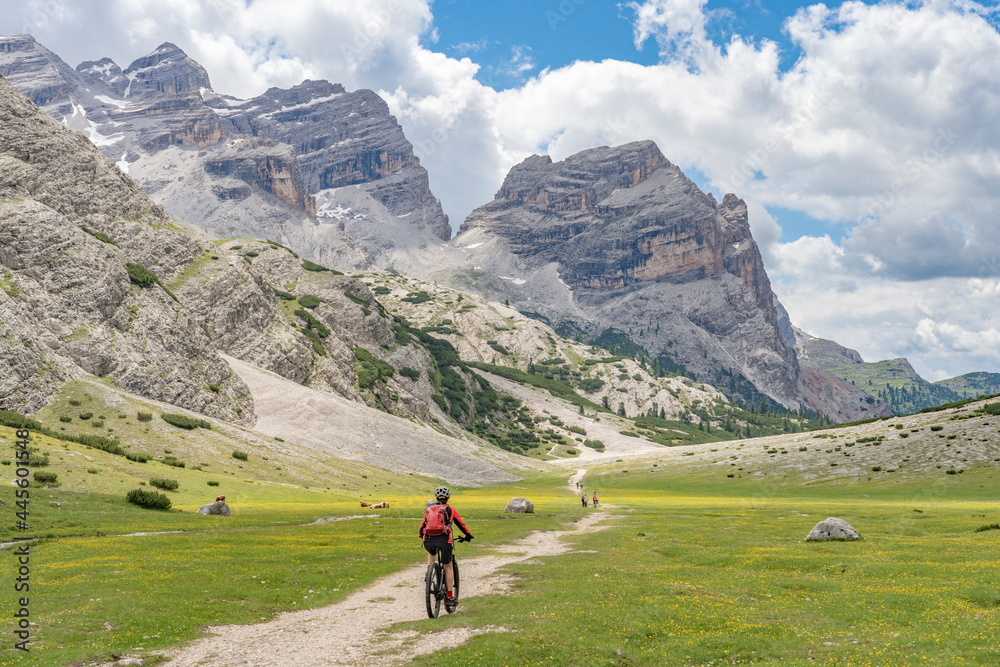 pretty active senior woman riding her electric mountain bike in the Fanes high Valley, part of Fanes-Sennes-Braies nature park in the Alta Badia Dolomites, South Tirol and Trentino, Italy
pretty active senior woman riding her electric mountain bike in the Fanes high Valley, part of Fanes-Sennes-Braies nature park in the Alta Badia Dolomites, South Tirol and Trentino, Italy