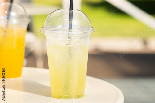 green refreshing lemonade cocktail on the veranda of the beach cafe