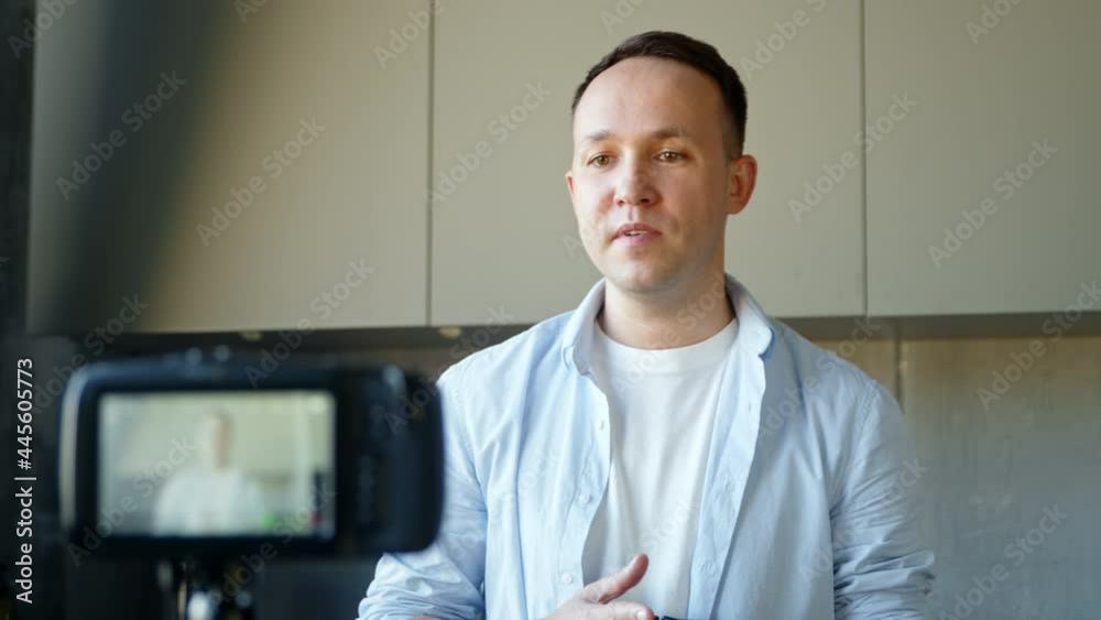 Professional blogger man with artificial limb hand talks Professional blogger man with artificial limb hand talks