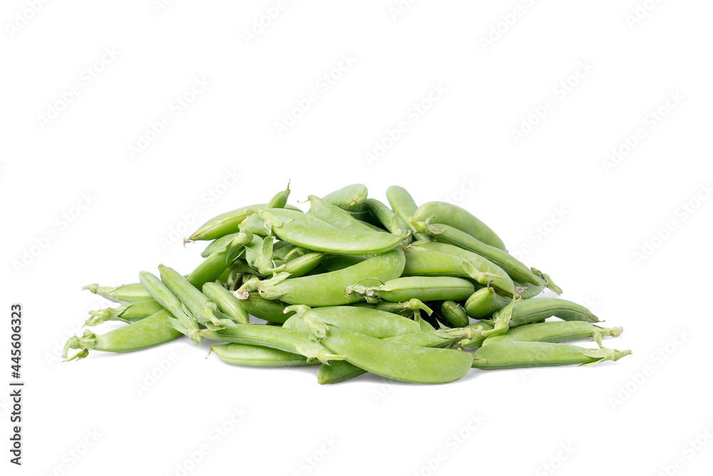 A pile of Sugar Snaps on a white table isolated A pile of Sugar Snaps on a white table isolated