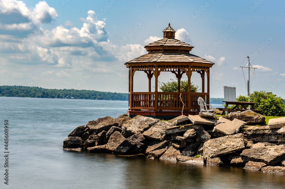 Waterfront gazebo on a rocky pier on the St. Lawrence River