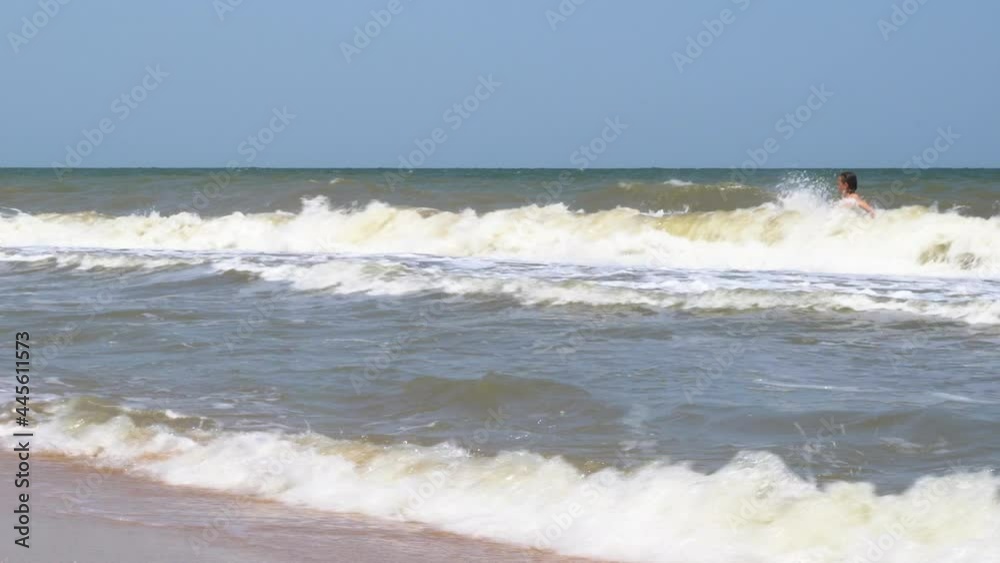 Sea shore. Sand beach. Small seashells. Waves. White foam. Dark water. Journey. Resort. A place to rest. Sunny day. Sea shore. Sand beach. Small seashells. Waves. White foam. Dark water. Journey. Resort. A place to rest. Sunny day.
