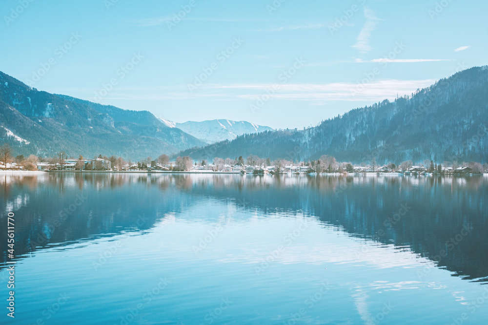 Picturesque fishing village on the coast of the lake Tegernsee. Alpine mountains in Bavaria. Mountain view, beautiful landscape in Germany. Adventure in Europe.