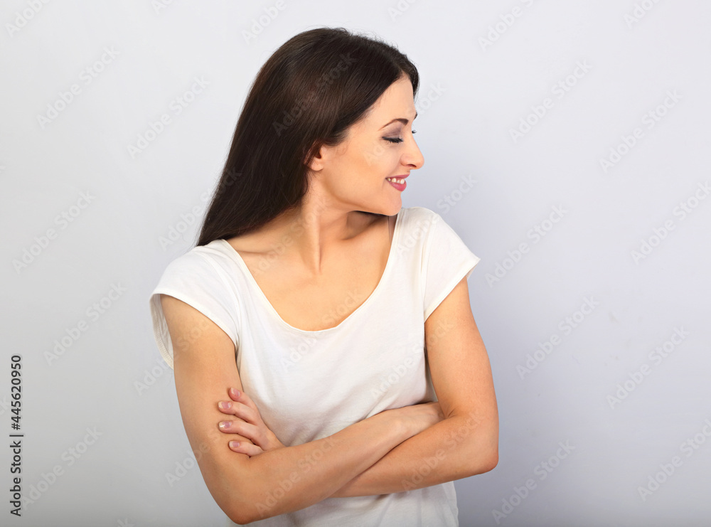 Happy loudly laughing woman with happy smile on blue background. Happy loudly laughing woman with happy smile on blue background.