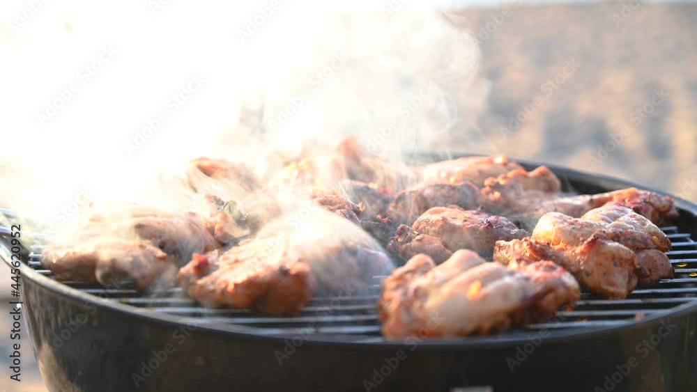 Close-up of grilling tasty chicken, mushroom and corn on barbecue. Process of cooking yummy outdoor food during sunset. Delicious food on metal skewer in bbq. 4K video footage. Close-up of grilling tasty chicken, mushroom and corn on barbecue. Process of cooking yummy outdoor food during sunset. Delicious food on metal skewer in bbq. 4K video footage.