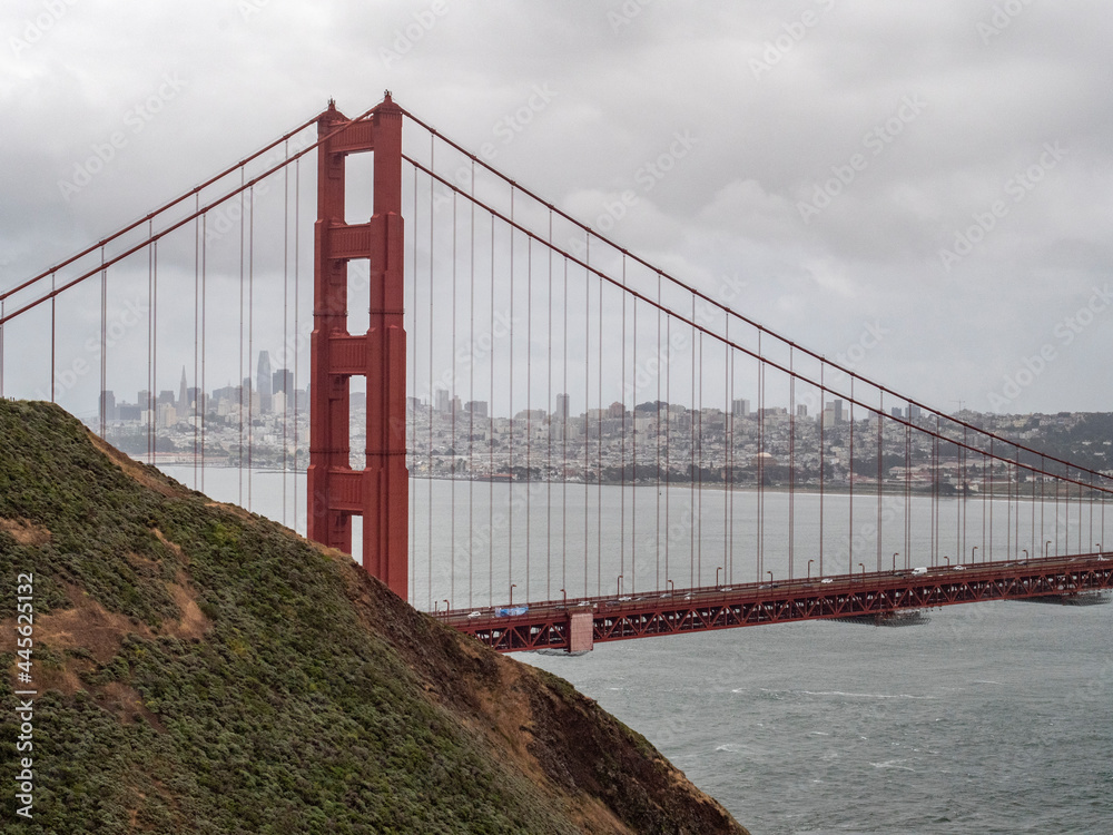 golden gate bridge behind hill golden gate bridge behind hill