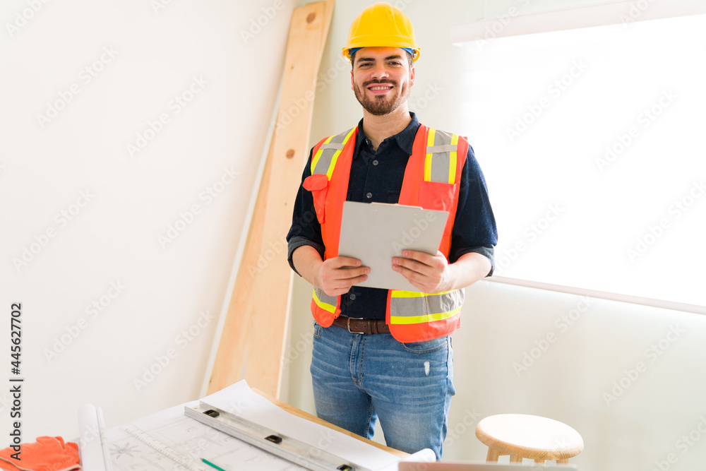 Portrait of a happy constructor working Portrait of a happy constructor working