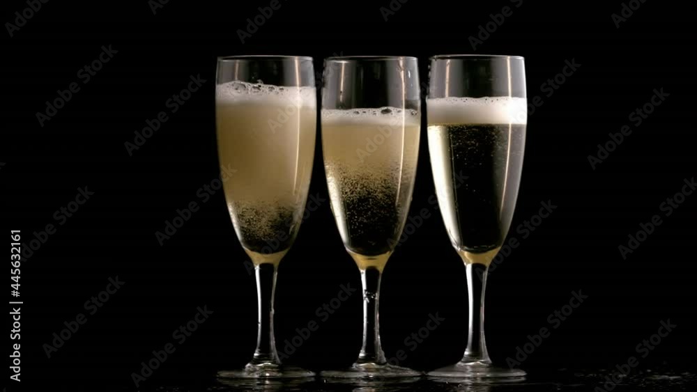 Animation of burning layer over glasses of champagne Animation of burning layer over glasses of champagne