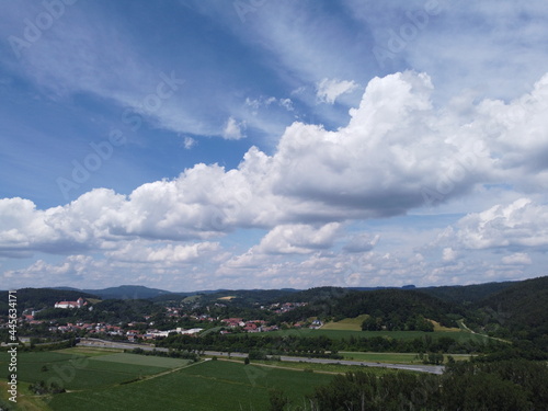 Panorama aerial view of Germany in Bavaria in summer with forest and meadow in the Danube region