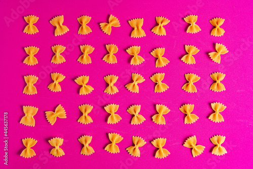 Farfalle Pasta on a pink background