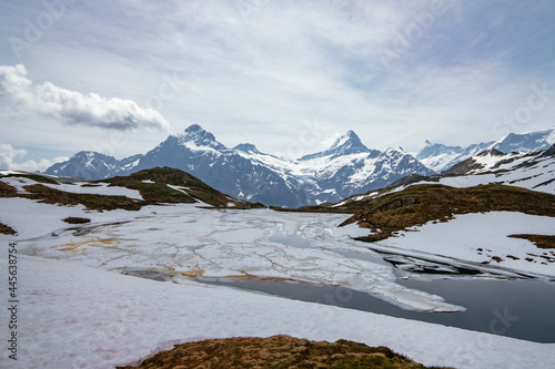 Panoramic View of the Frozen Lake Bachalpsee in the Summer - First, Grindelwald, Switzerland - Swiss Alps Mountains - Jungrau Region, Bernese Oberland photo