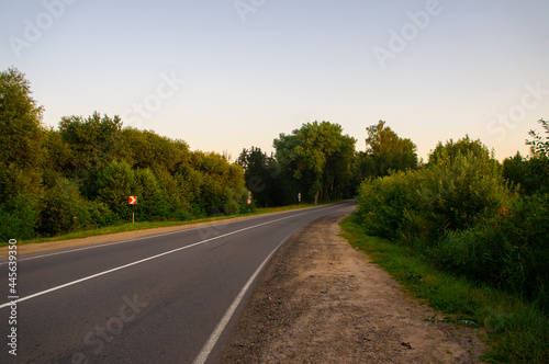 Empty road turn at dawn