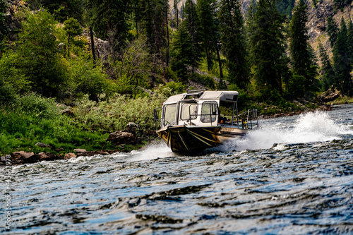 Salmon River - 7-2-2021:  jet boat under power on the Salmon River in the Frank Church River of no Return wilderness area in northern Idaho USA photo