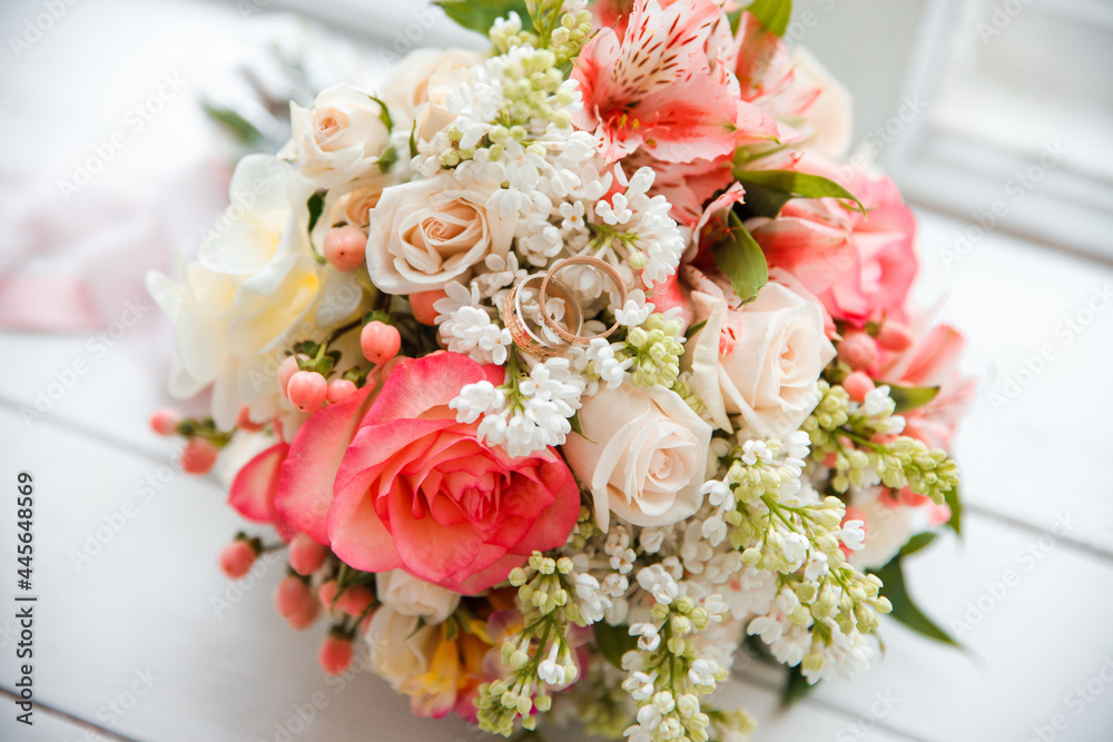 Wedding pink delicate bouquet of roses with rings. Wedding pink delicate bouquet of roses with rings.
