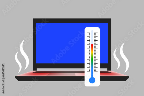 Laptop with white steam from hot red surface and thermometer