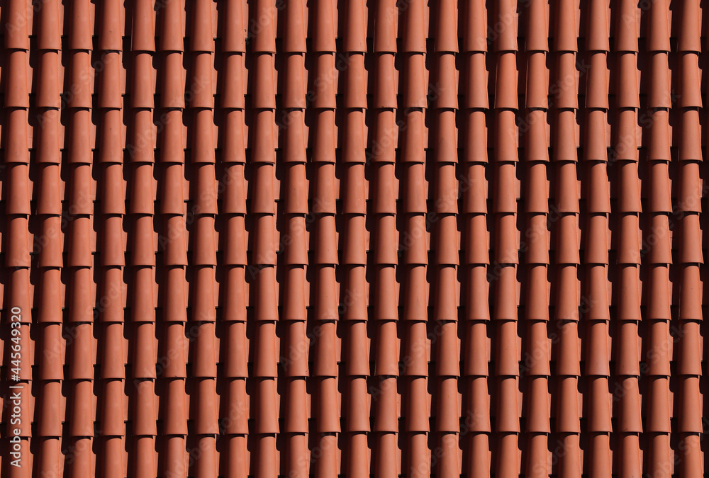 Ceramic roof tiles equally arranged 
