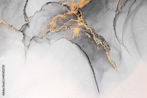 Black gold abstract background of marble liquid ink art painting on paper . I...
