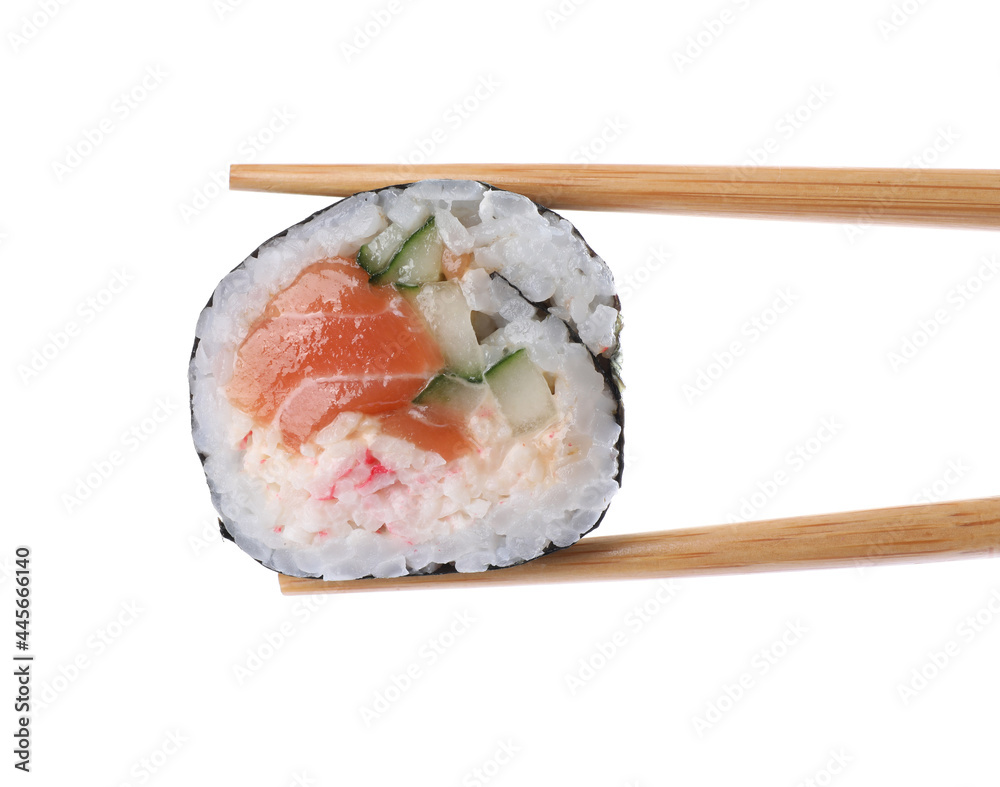 Chopsticks with tasty sushi roll on white background, closeup Chopsticks with tasty sushi roll on white background, closeup