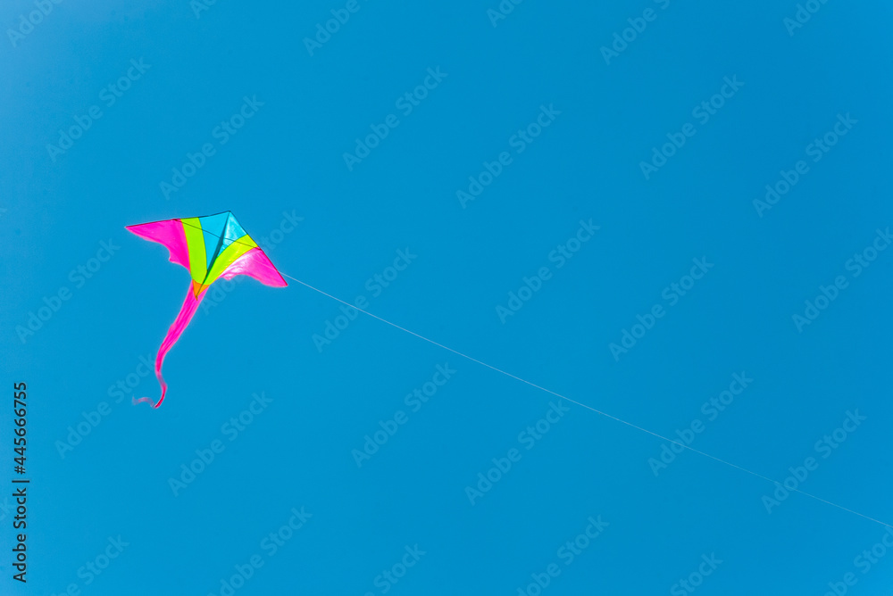 Kites fly in the beautiful sky with various colors such as blue, yellow, pink, floating in the air. Kites fly in the beautiful sky with various colors such as blue, yellow, pink, floating in the air.