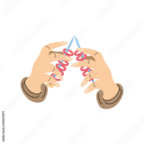 hands knitting with red wool