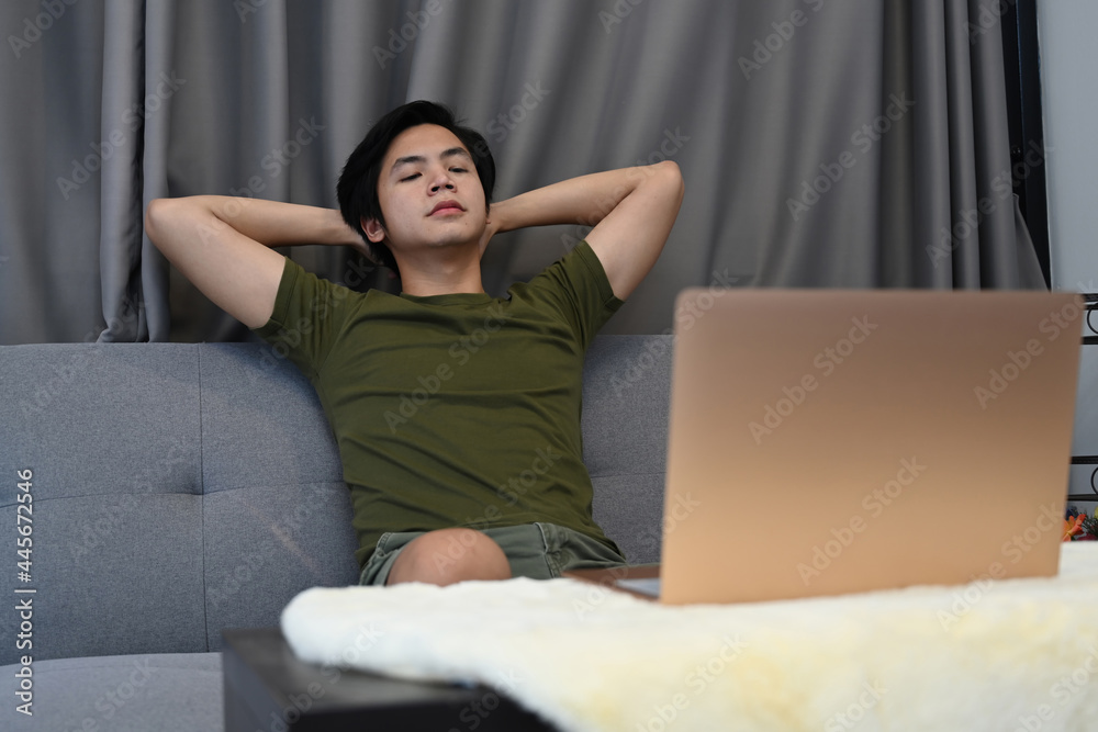 Casual man resting on comfortable sofa at home. Casual man resting on comfortable sofa at home.