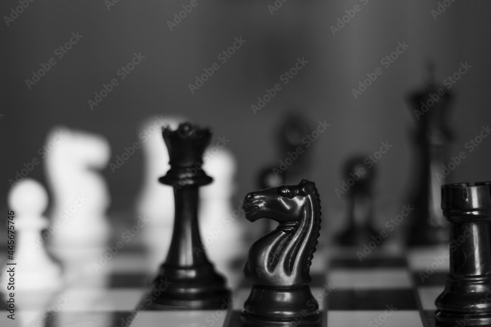 Chess pieces on a chessboard Chess pieces on a chessboard