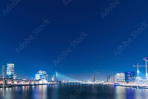 Night view of Rotterdam in the Netherlands, brightly lit, a bustling scene © Wheat field