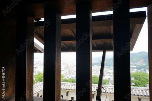 City View from Wooden Lattice window of Matsuyama Castle in Ehime  Japan -                                                  
