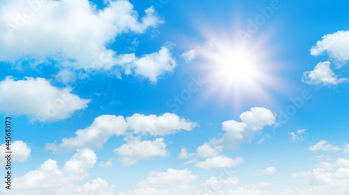 Sunny day background  blue sky with white cumulus clouds and glaring sun  natural summer or spring background with perfect hot day weather  3D illustration.