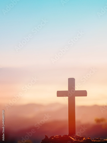 Cross on mountain in the morning natural background.