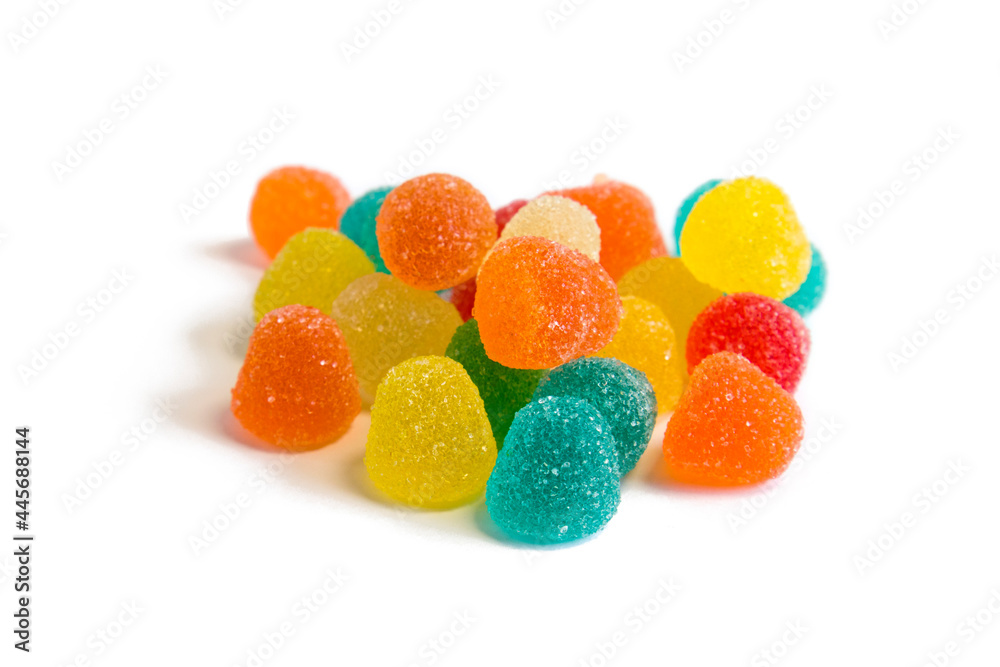 Bright colorful jelly candies in sugar isolated on white background Bright colorful jelly candies in sugar isolated on white background