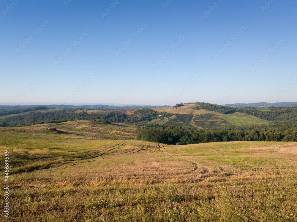Scenic view of hilly countryside in village of Bukovica near Derventa during clear sunny summer day.