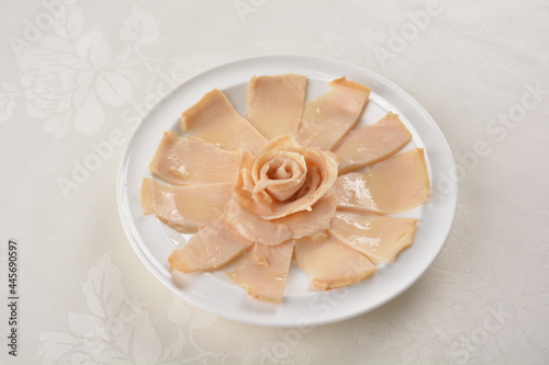 raw 10 head fresh abalone in slice and whole piece in white background asian seafood halal sashimi menu