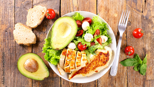 grilled chicken fillet with salad and avocado