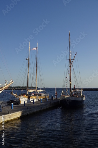 View to Tall ships on the dock during Tallinn Maritime Days - Marine festival in Estonia in Seaplane harbor (Lennusadam) near Noblessner district. Blue clear sky and navy sea. Estonia, EU. July 2021 © JSF15photo