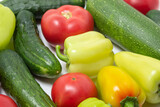 Vegetables on a white background. Ripe natural vegetables. Healthy diet. Vegetables close-up