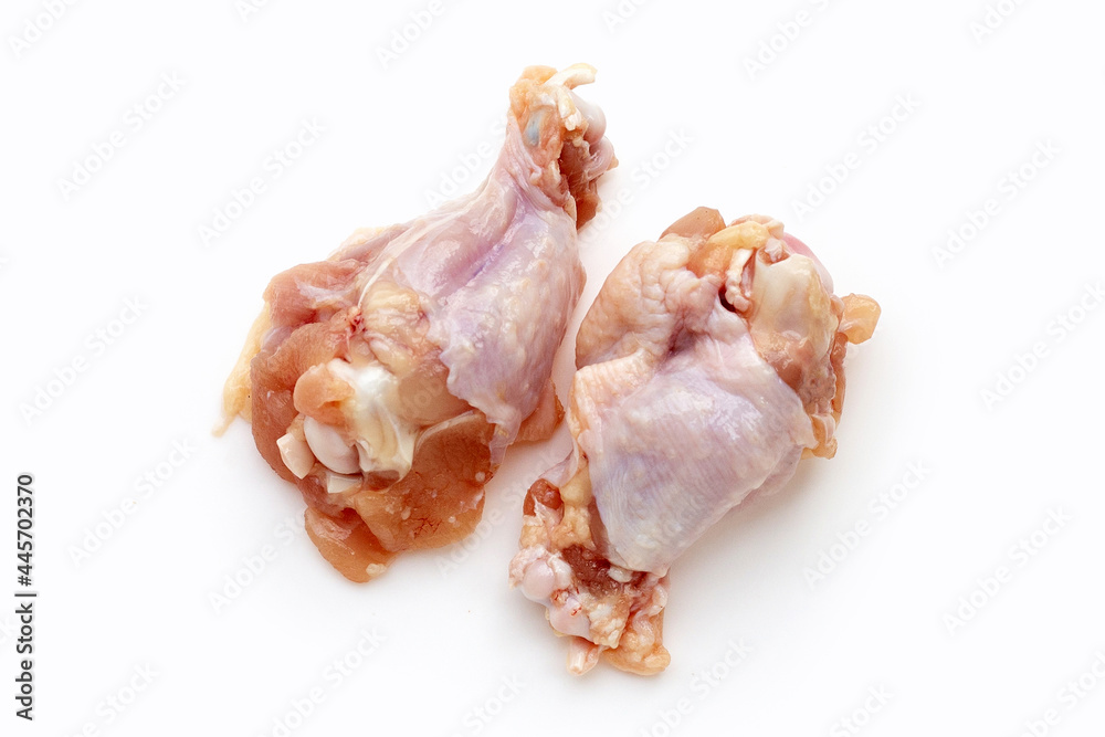 Fresh raw chicken wings (wingstick) on white background. Fresh raw chicken wings (wingstick) on white background.