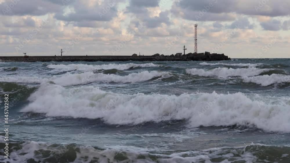 Pier of Klaipeda harbour in stormy weather.