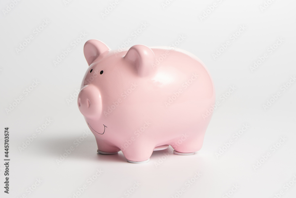 Pink piggy bank on a white background