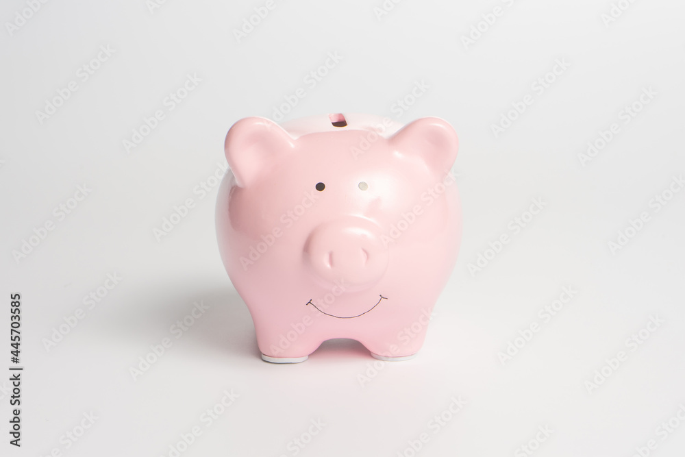 Pink piggy bank on a white background