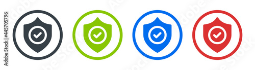 Shield icon with checkmark vector symbol. Protection, warranty and guarantee on circle sign. photo